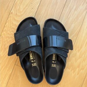 Birkenstock Black Slide Sandals with Glossy Strap
